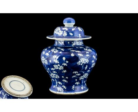 Chinese Antique Kangxi Period Blue and White Temple Jar of bulbous form with matching cover decorated in under glazed blue wi