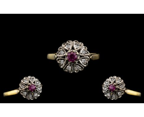 Antique Period 18ct Gold Attractive Ruby and Diamond Set Ring. The Central Ruby Surrounded by Eight Diamonds of Good Colour. 