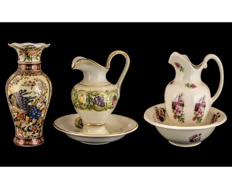 Two Decorative Ceramic Water Jug and Bowl Sets comprising one of Portugese origin, floral decoration and one with plain white