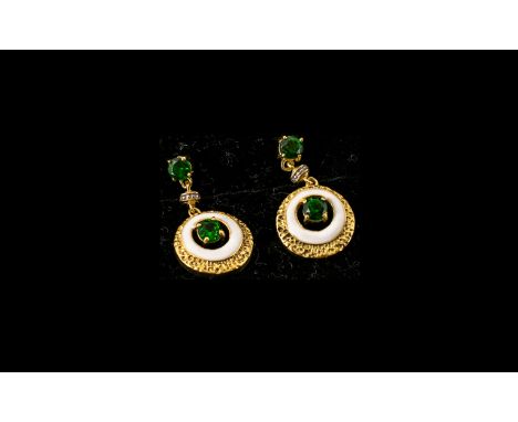 Russian Diopside Drop Earrings, a pair of circular pendant drops, each with a round cut, deep green, Russian diopside, offset