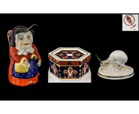 A Trio of Ceramic Items - Including Royal Crown Derby and Royal Worcester. Comprises 1/ Royal Crown Derby Six Sided Lidded Tr