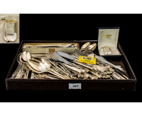 Large Collection of Flatware comprising cake servers; butter knives; sundae spoons; silver teaspoons; dessert knives and fork
