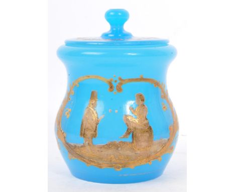 An early 20th Century blue opaline glass lidded sugar bowl / tobacco jar in the manner of Mary Gregory. With ovoid bowl to li