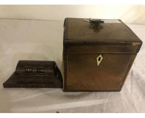A 19th century mahogany caddy; together with a bakelite calendar
