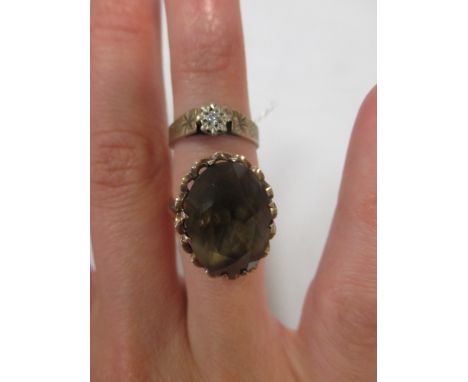 A 9ct smokey quartz dress ring, together with a 9ct illusion set single stone diamond ring (2)  