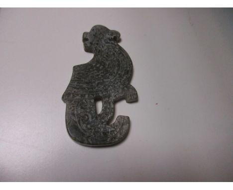 A Chinese jade plaque of a parrot, 9cm (3.5 in) wide  