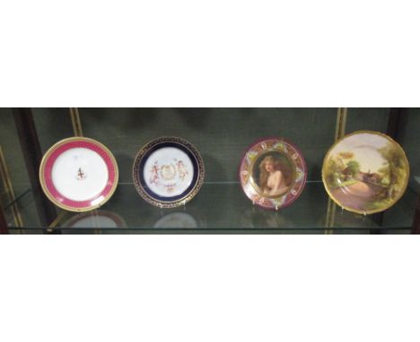 Two Worcester plates, a Sevres plate and a Vienna plate  