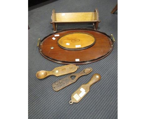 Two Edwardian mahogany inlaid trays, together with a book trough and a small collection of Welsh love spoons  