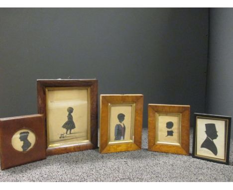 A collection of five miniature portrait silhouettes  
