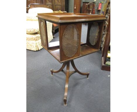An Edwardian revolving bookcase with tray top on tripod base, 74 x 42 x 42cm  