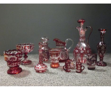 A group of ruby overlay and other glass  