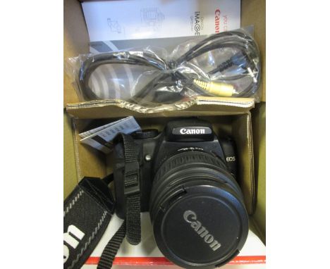 A Canon EOS 350D digital SLR camera, an EFS 18-55 lens, EF 100-300mm lens, EF100 macro lens, EF28-80mm lens, battery charger,