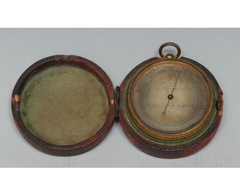 A 19th century French gilt brass aneroid pocket barometer, 4.5cm silvered register inscribed Maison de Chevalier Optician. Pl