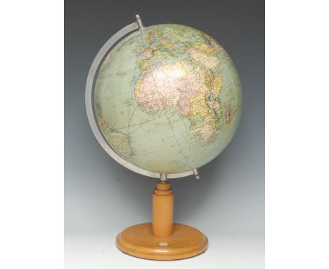 An Art Deco period terrestrial 13" desk globe, marked with Trans-Atlantic Zeppelin routes, turned base with inset compass, 56