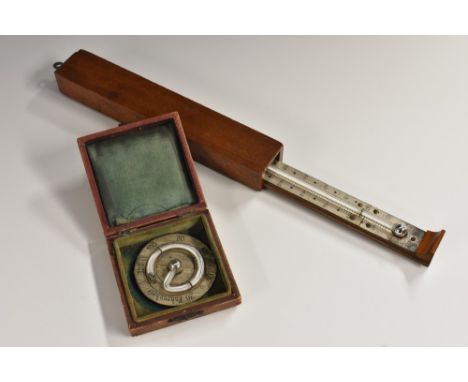A 19th century mahogany travelling thermometer, the silvered register reversing for the pocket, 17cm long; another (2)