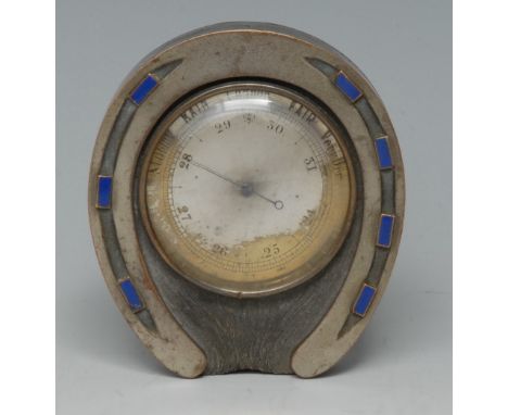 An early 20th silvered copper and enamel novelty desk barometer, as a horseshoe, 5cm circular register, 8.5cm long, c.1910
