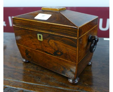 A Regency rosewood sarcophagus shaped tea caddy