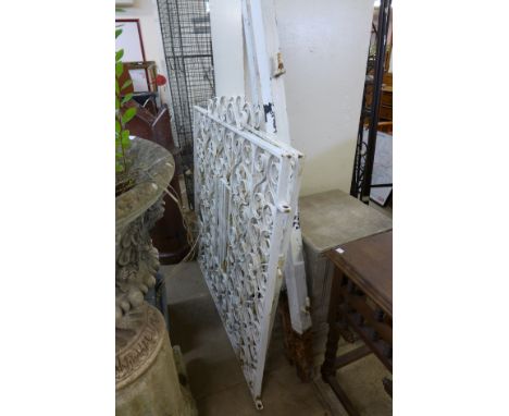 A wrought iron garden gate