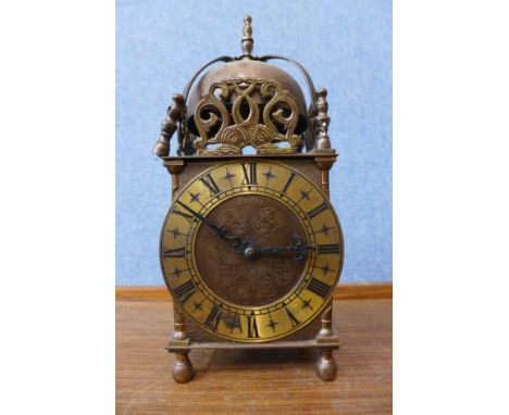 A Smiths brass electric lantern clock