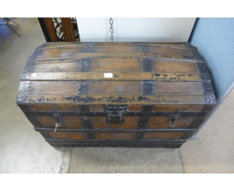 A Victorian pine dome topped steamer trunk