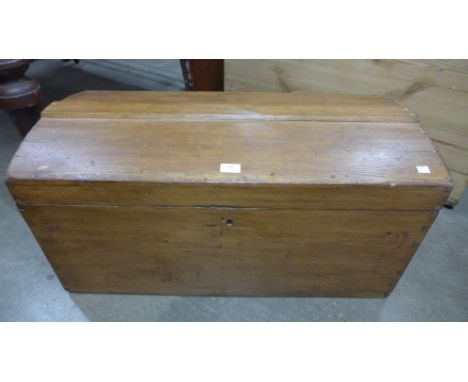 A Victorian pine dome topped steamer trunk