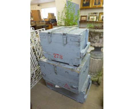 Three wooden ammunition boxes