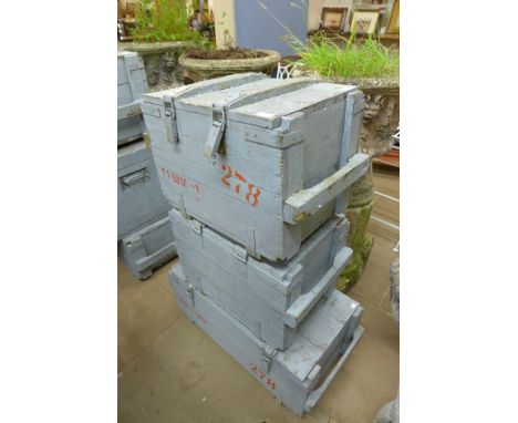 Three wooden ammunition boxes