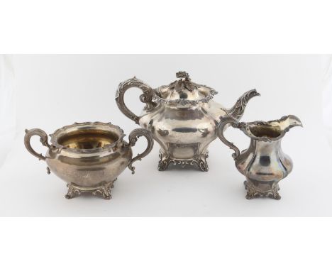 Victorian cast silver teapot with foliate scrolls, by Charles Reily & George Storer, London 1842, 24.5oz 763.7gm together wit