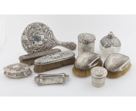 Various dressing table items to include cherub pin tray, pin box, dressing table jars, hand mirror and brushes