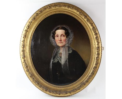 Nineteenth-century English School, oval portrait of a lady. Oil on canvas. Framed. Image size 76 x 60cm.  