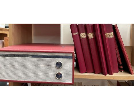 A Marconiphone record player together with Cue World magazines 