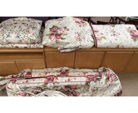 A pair of curtains  127" wide with a 99" drop with swag and tail pelmet, with large pink roses and other garden flowers toget