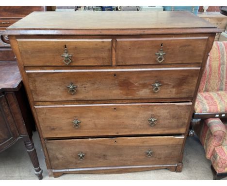 An Edwardian walnut chest, with a rectangular moulded top above two short and three long drawers on bracket feet
