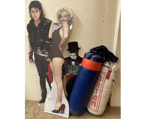 Two punch bags together with Marilyn Monroe, Michael Jackson, Winston Churchill cutouts etc