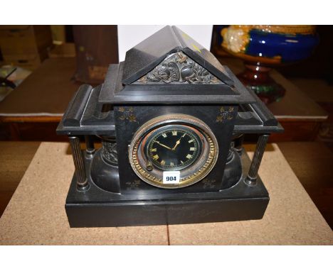 A Victorian marble and slate mantel clock.
