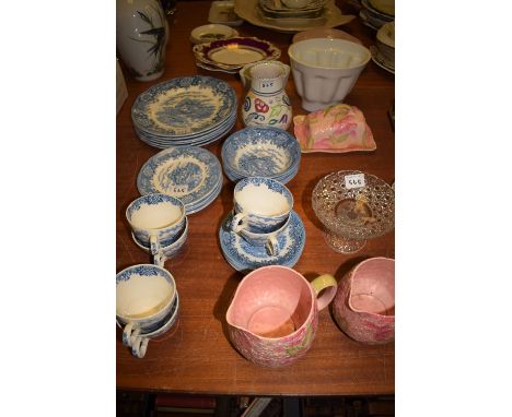 Two Crown Ducal 'Primrose' pattern jugs; a butter dish; a Poole vase; two jelly moulds; a hobnail pattern glass tazza; and a 