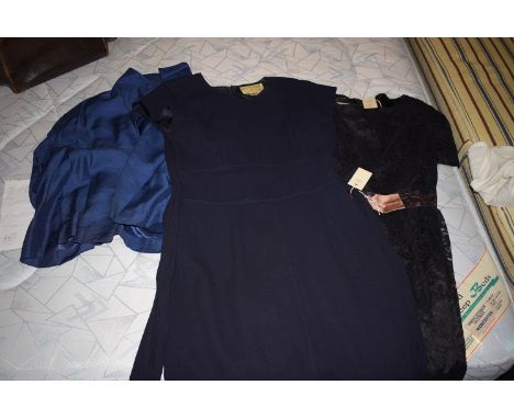 A navy 1940's Jaeger dress; an L 'Aiglon black 1950's prom dress with pink ribbon to waist; together with a 1950's blue eveni