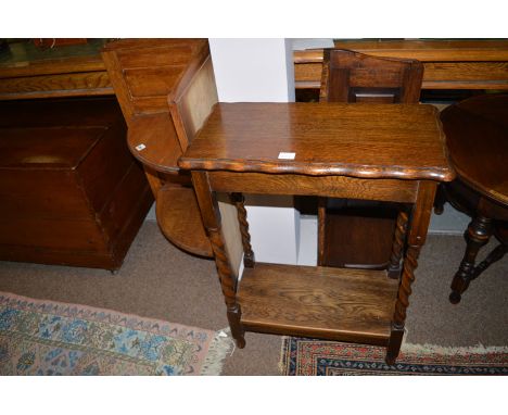 Two oak corner shelf units; and an oak two-tier occasional table.