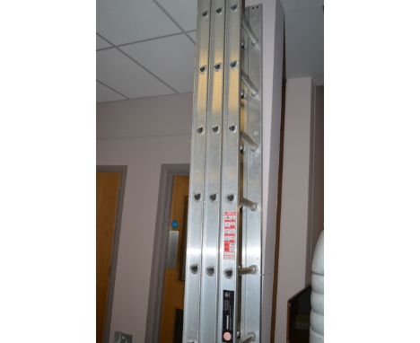 A three section extending ladder.