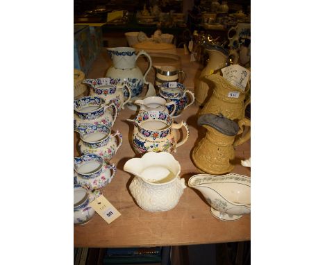 *A collection of 19th Century jugs comprising, two Ridgeway jugs; a T. & R. Boote jug; and others by Martin, Shaw & Cope, Gre
