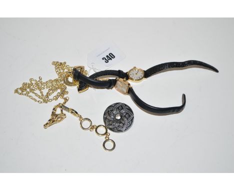 A 9ct. gold cased cocktail watch, by Marvin; a Rotary wristwatch with mother-of-pearl dial; a giltmetal chain and pendant; an