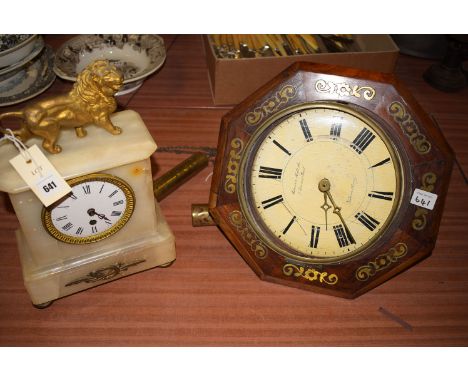 *A 19th Century onyx mantel clock, roman dial, giltmetal lion to top; together with a wall clock by Camerer Kuss & Co., Bloom