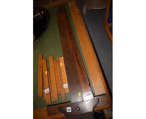 *A collection of nine boxwood rules and scales various; together with two wooden drawing board T-Squares.