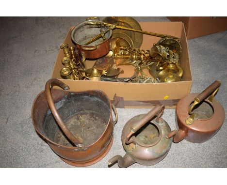 A collection of old brass and copper ware, including: kettles; candlesticks; coal scuttle; toasting fork; etc., in a box.