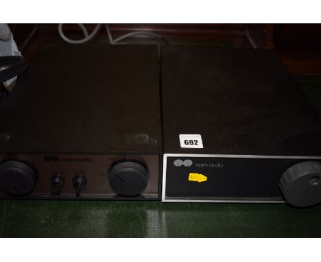A Naim Audio NAC62 pre-amplifier and NAP 90 power amplifier; together with Naim Audio speaker cables and power connector.