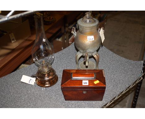 A 19th Century mahogany sarcophagus-shaped tea caddy; a table oil lamp with glass chimney; and a coffee percolator.