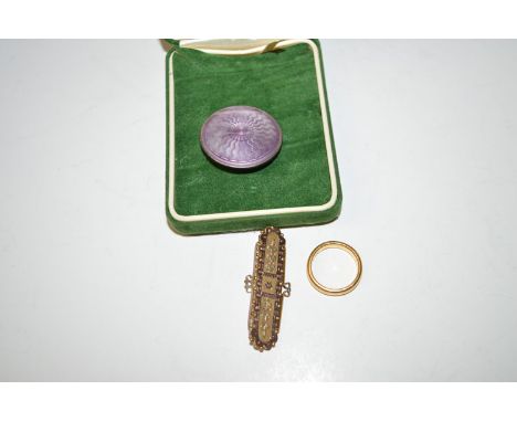 A 22ct. gold wedding band, ring size K, 7grms; together with a 9ct. gold brooch; and a silver and purple enamelled brooch.