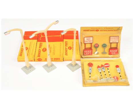 Dinky Group of Accessories - including 2 x 755 Lamp Standard (single arm); 756 Lamp Standard (double arm); 778 Road Repair Wa