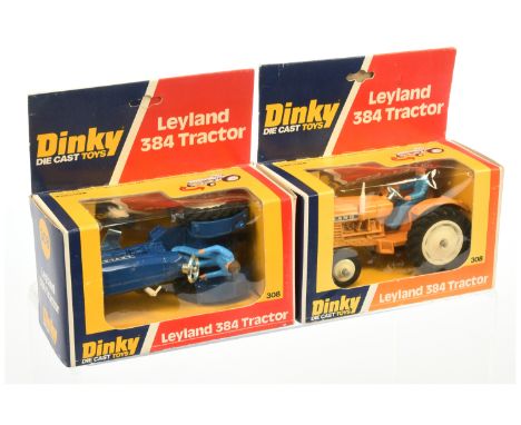 dinky 2 x 308 Leyland 384 Tractor - both have figure driver, bare metal base, white hubs - (1) rare orange body, sun faded mo