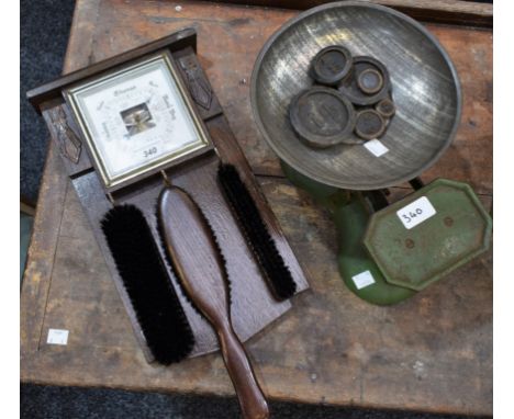 Boxes and Objects - an Art Deco carved oak hall aneroid barometer, silvered square scale, above three suspended brushes, 40cm